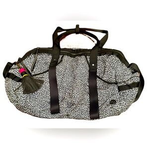 Lululemon Extra Mile Duffel Bag in Miss Mosaic Black. Like New Condition!